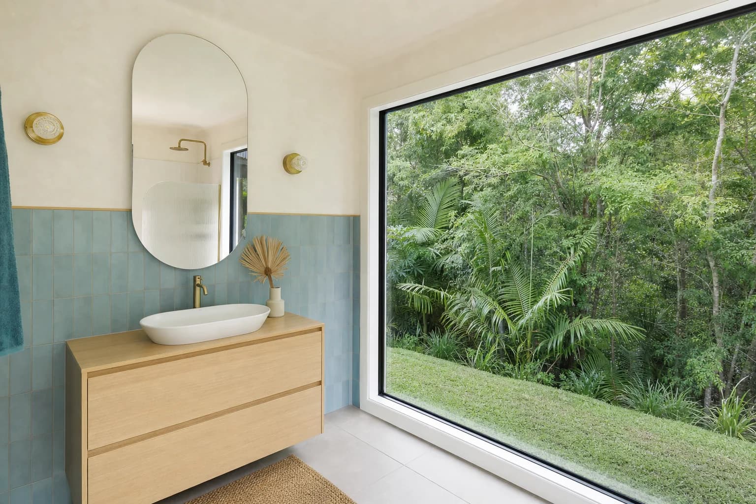 A finished bathroom in a Federal hinterland house looking out to subtropical green through a wide window